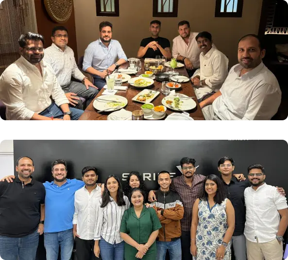 Team Augnito posing in front of historic building with ornate architecture and gardens; employees attending company presentation in Augnito office, attentively listening to speaker